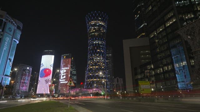Bustling City Night with Glowing Skyscrapers
