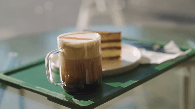 Close-up of a drink and dessert on a table