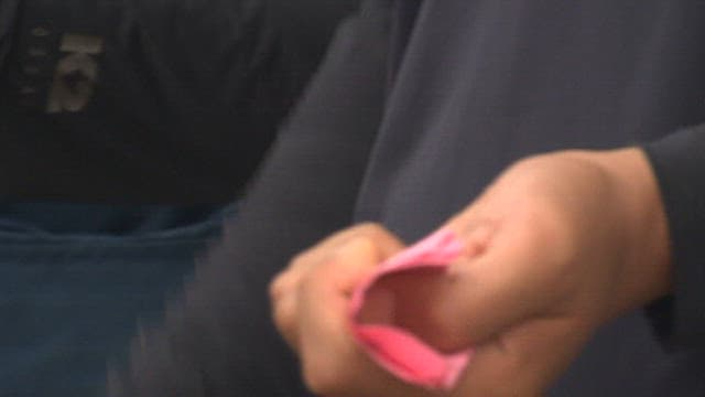 Hands of People Trading at a Fish Market Auction