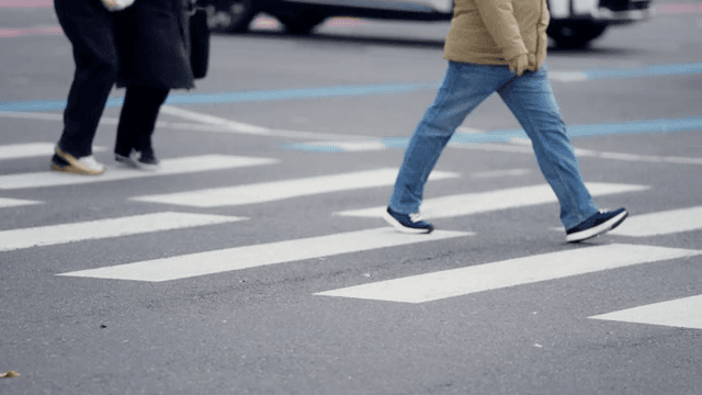 People crossing a crosswalk