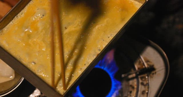 Making Egg Roll on an Outdoor Grill