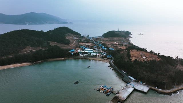 Coastal Landscape with Boats and Docks