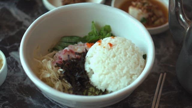 Raw Fish Bibimbap Topped with Vinegar Hot Sauce