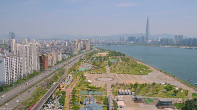 Riverfront Park and City Skyline on a Sunny Day