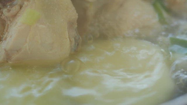 Ginseng chicken soup boiling in a pot