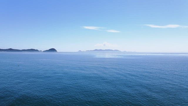 Vast ocean with distant islands