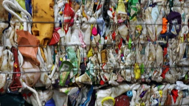 Plastic waste compressed for recycling