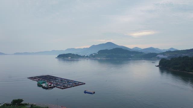 Tranquil coastal landscape with mountains
