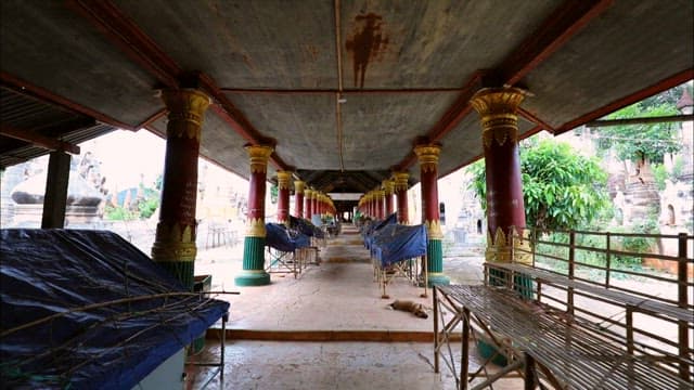 Serene Buddhist Temple Featuring Statues and Pagodas