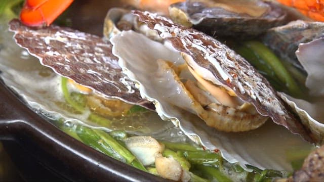 Steaming Seafood Hot Pot with Various Shellfish and Octopus