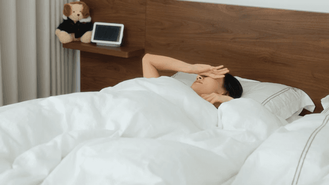 Woman Resting in Bed Throughout the Day