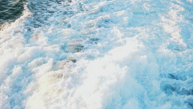 Turbulent Ocean Waves in Sunlight