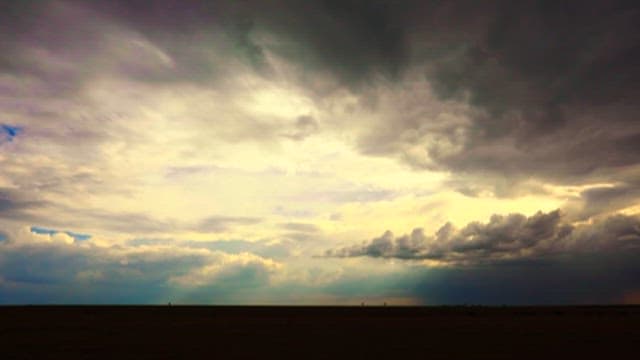 Dramatic Clouds Over Vast Open Plains