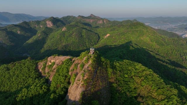 Pavilion on a Lush and Green Mountain Peak