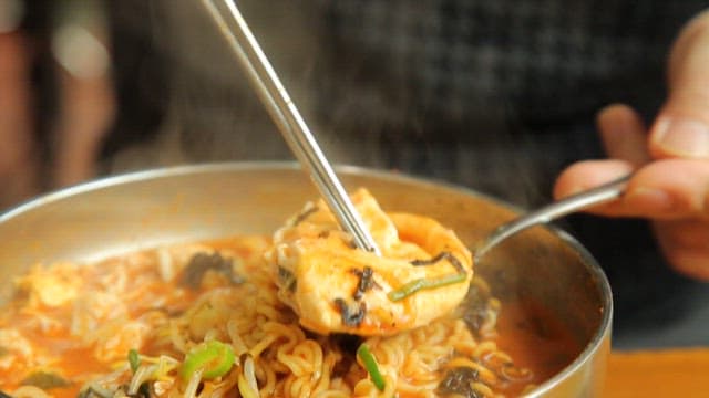 Steaming bowl of Korean ramen with egg