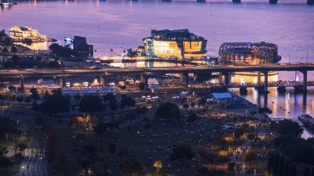 Sunset at riverside park with colorful lights