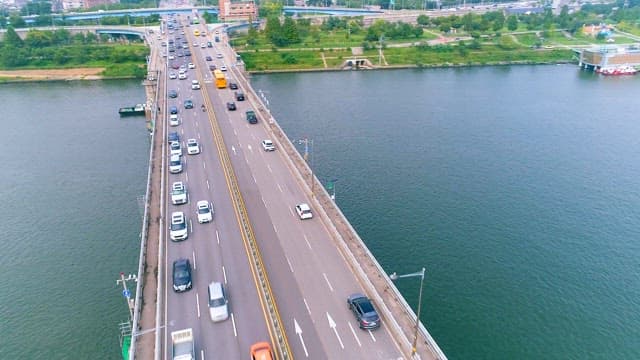 Cars on a Bridge over the Han River on a Cloudy Day
