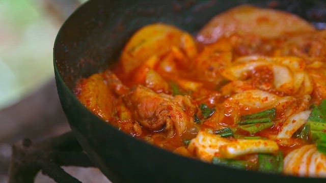 Delicious and spicy braised spicy chicken simmering in a pot