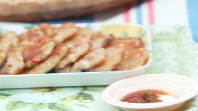 Golden Brown Pancakes Dipped in Soy Sauce