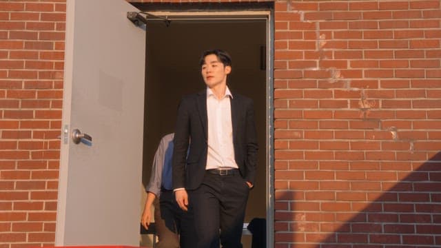 Two people stepping out onto a rooftop