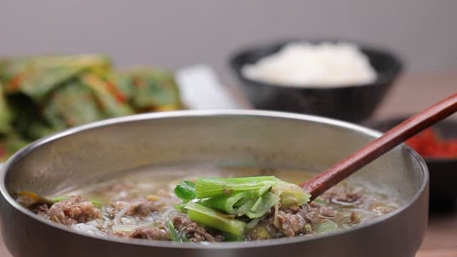 Spoonful of savory yukgaejang with green onions