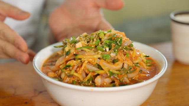 Swordtip squid cold raw fish soup with fresh vegetables