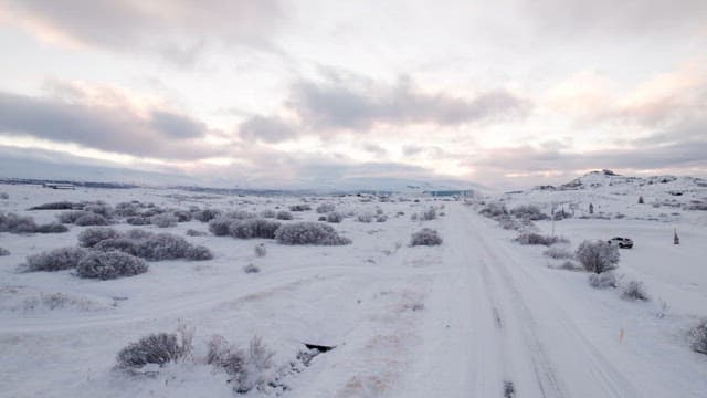 Snow-covered mountains and vast plains