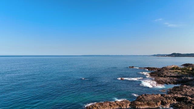 Coastal landscape with clear blue sea