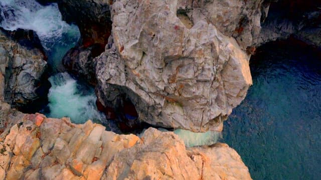 Water Flowing through a Rocky Valley