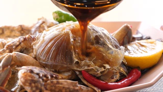 Soy Sauce Marinated Crab with Lemon and Peppers