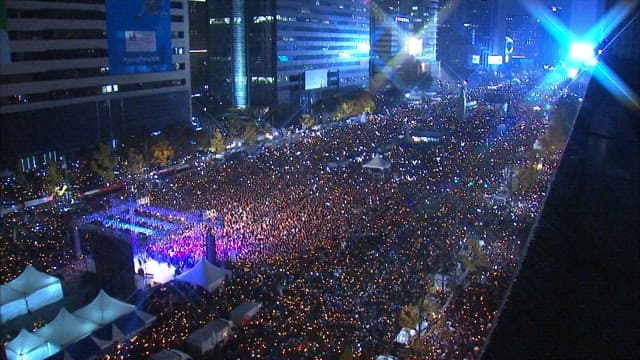 Dense Crowd Gathering in Square in the City