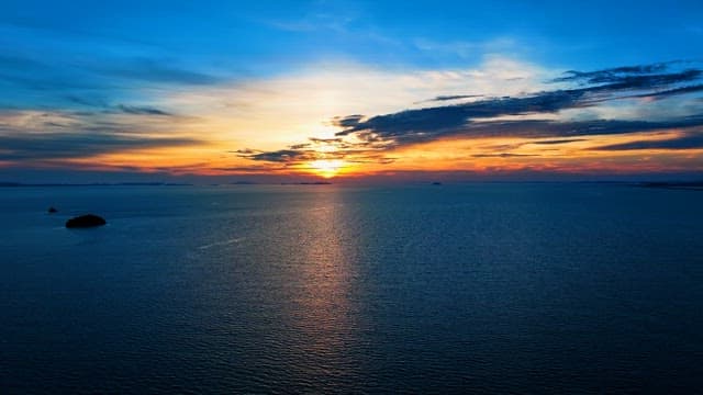 Sunrise in the Morning on a Calm Sea