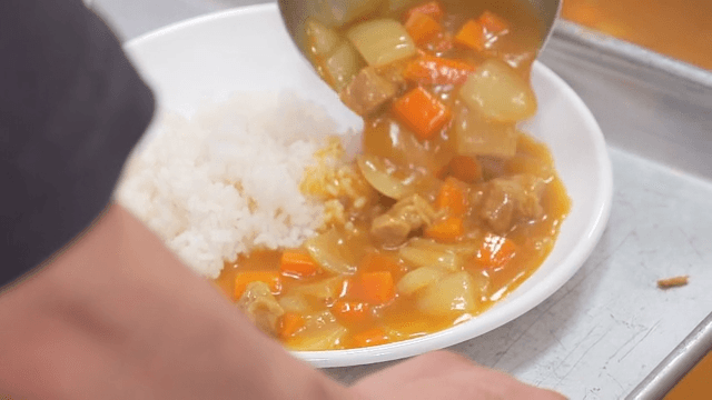 Curry with Plenty of Carrots Served on Top of Rice