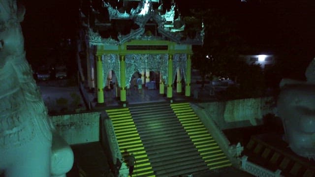 Illuminated Shwedagon Pagoda Entrance at Night