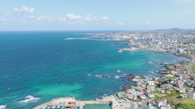 Coastal city with clear blue sea