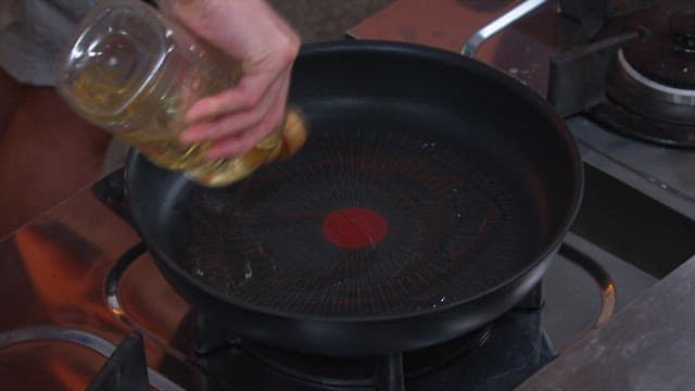 Pouring Oil into a Preheated Frying Pan