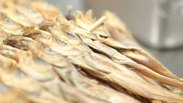 Dried fish arranged in a pile