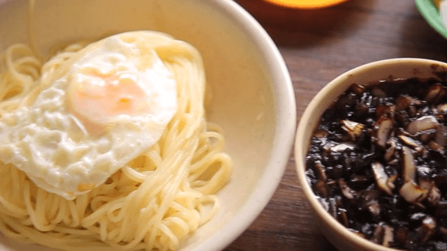 Noodles and thick black bean sauce set on the table