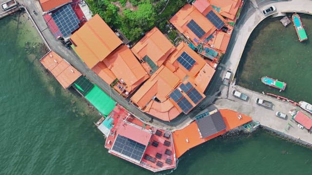 Coastal village with solar panel rooftops