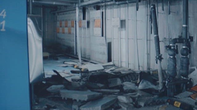 Devastated industrial facility viewed on a computer screen