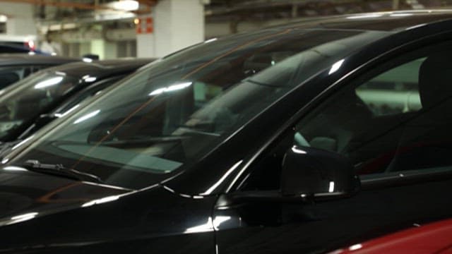 Rows of Cars Parked in an Indoor Garage