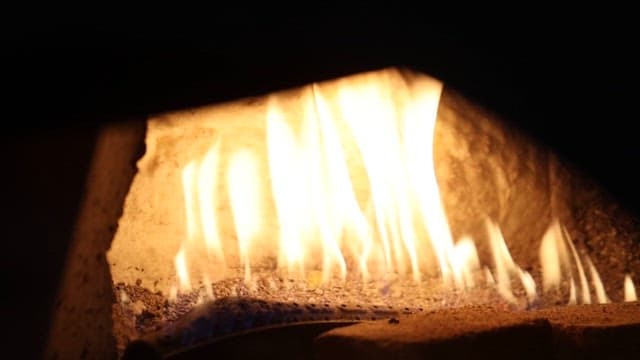Juicy steak cooking in a fiery oven