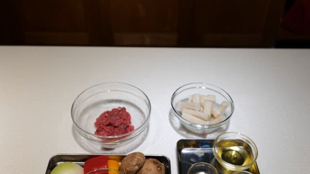 Ingredients for royal tteokbokki placed on the kitchen counter