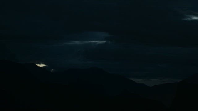 Changes in the sky over mountainous terrain