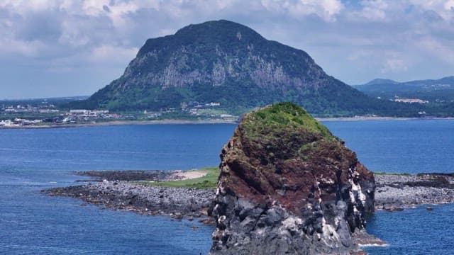 Beautiful scenery of Yongmeori Coast with mountains visible on the other side
