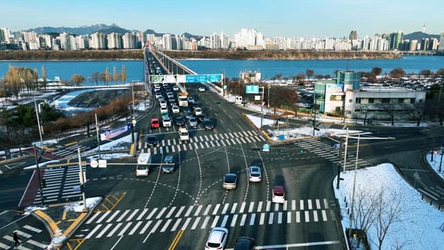 Busy Urban Traffic Intersection in Winter