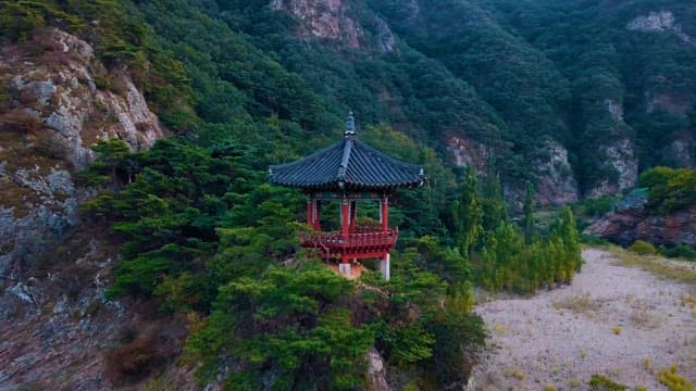 Traditional Pavilion Nestled on a Cliffside