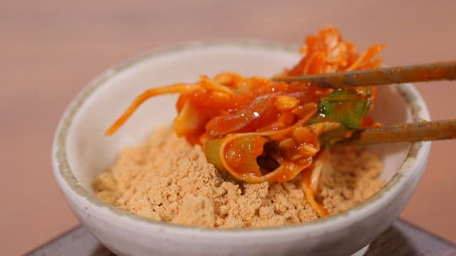 Fresh trout sashimi salad marinated in soybean powder