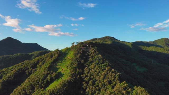 Aerial View of a Lush Green Mountain Range