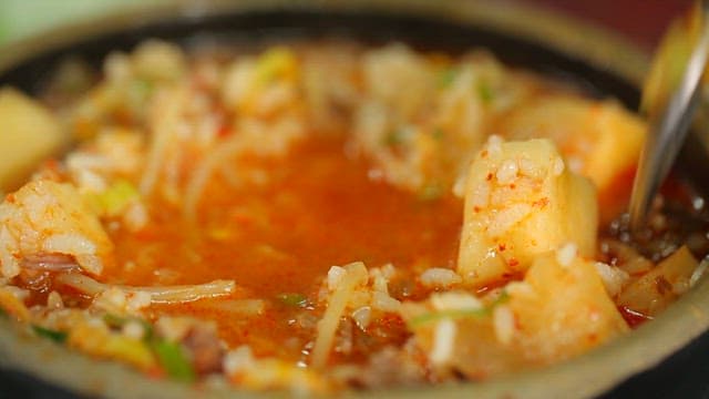 Beef soup with diced radish kimchi